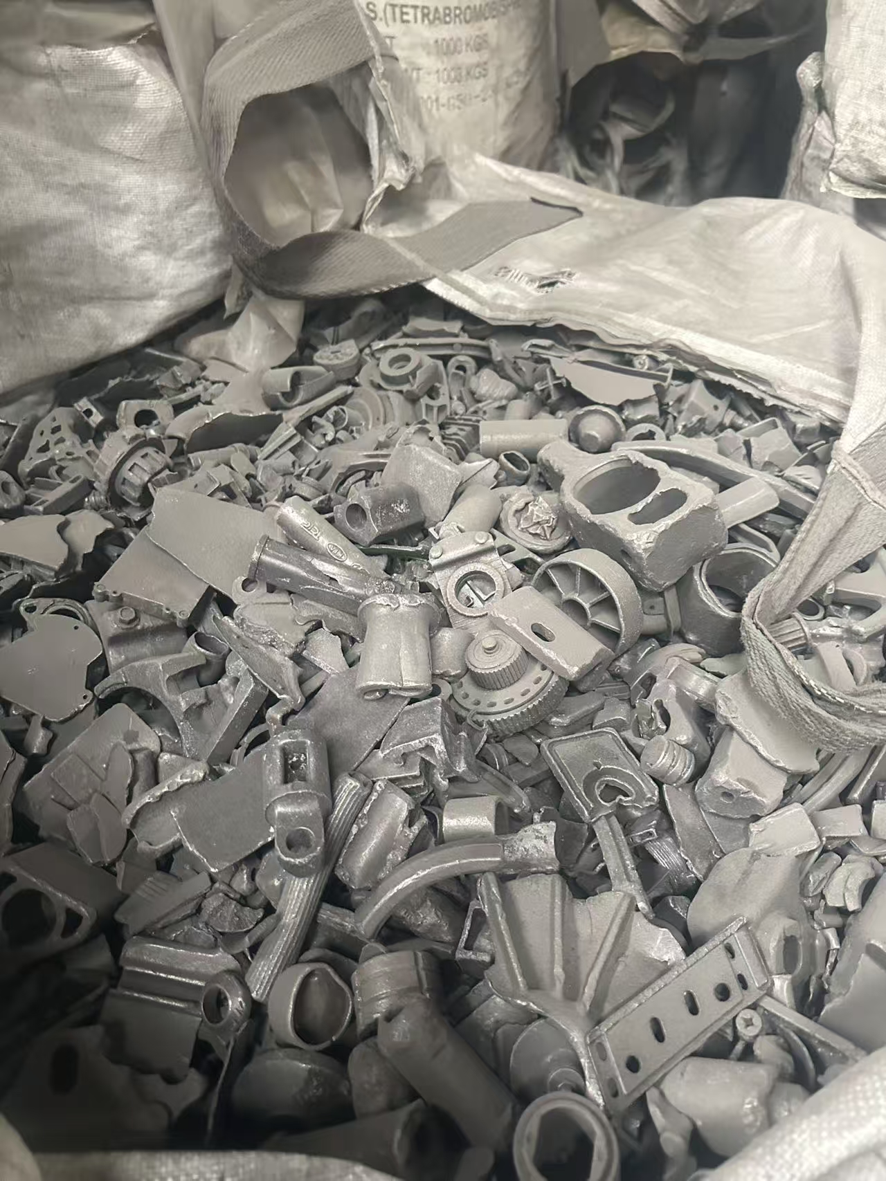 Shredded metal scrap contained in industrial bags