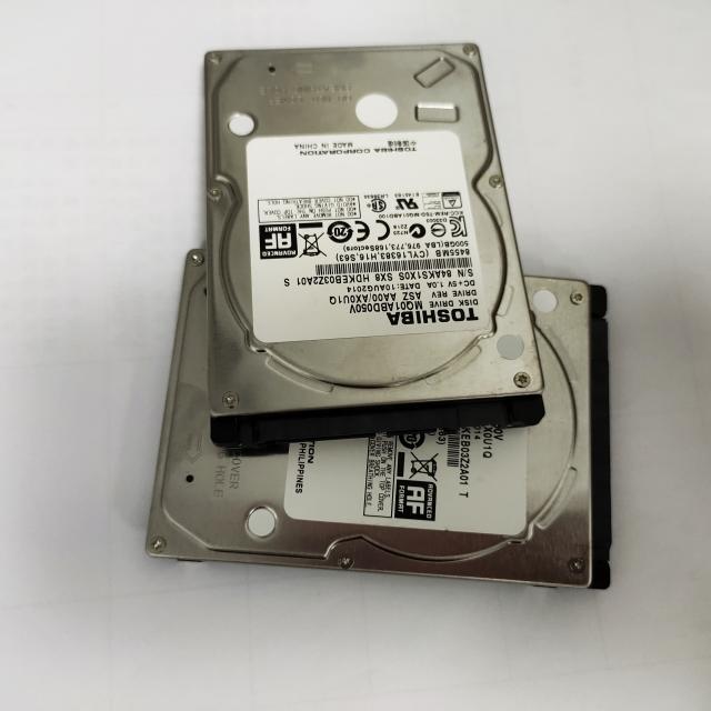 Server components hard drives displayed with connectors visible