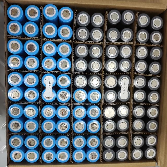 Bulk lithium battery packs standing on a minimal surface